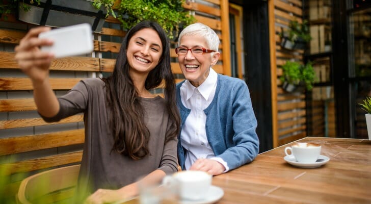 A mother and daughter video chat with a family member, having just set up a spendthrift trust.