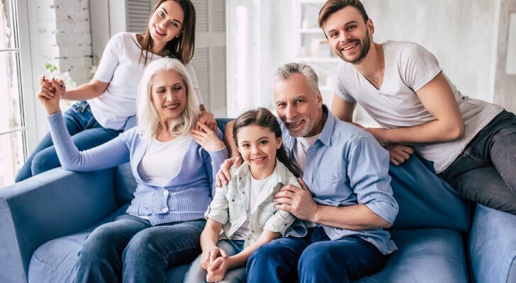A family poses together, having created a living trust in Vermont.