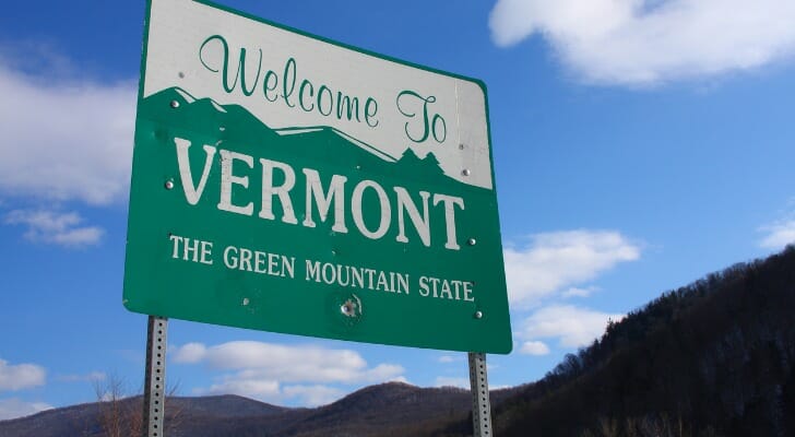 A sign reading "Welcome to Vermont."