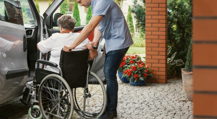 A woman in a conservatorship gets into a vehicle.
