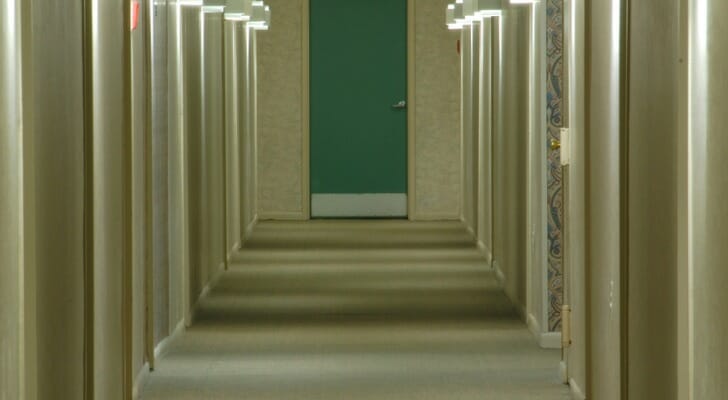 An apartment complex hallway. Compared to single-family rental properties, apartment tenants are more likely to move more often.