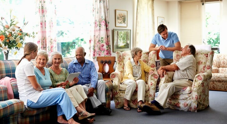 A group of seniors discussing long-term care.