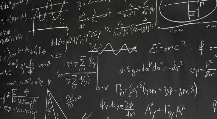 Mathematical equations on a blackboard. The Black-Litterman (BL) model is a mathematical technique used to create investment portfolios.