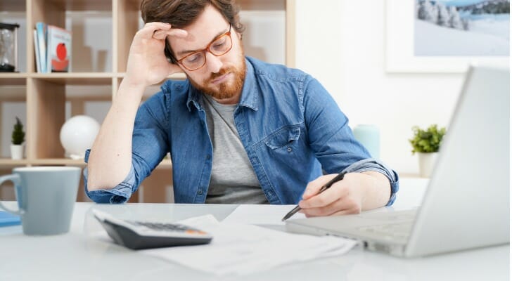 A man prepares for the Series 3 securities license exam.