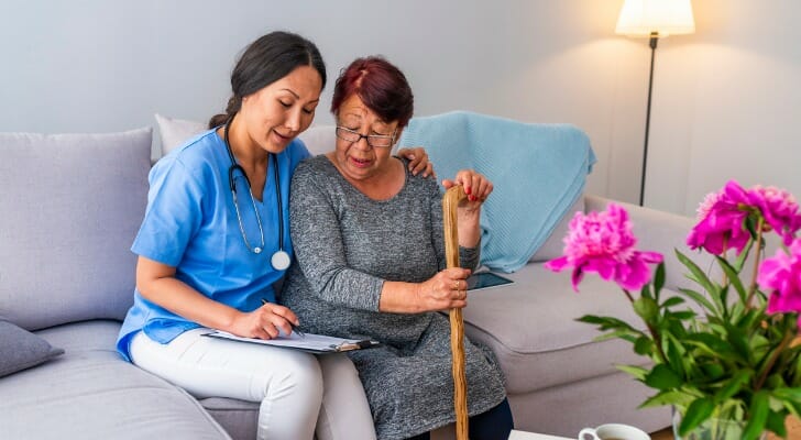 Nursing home resident with nurse