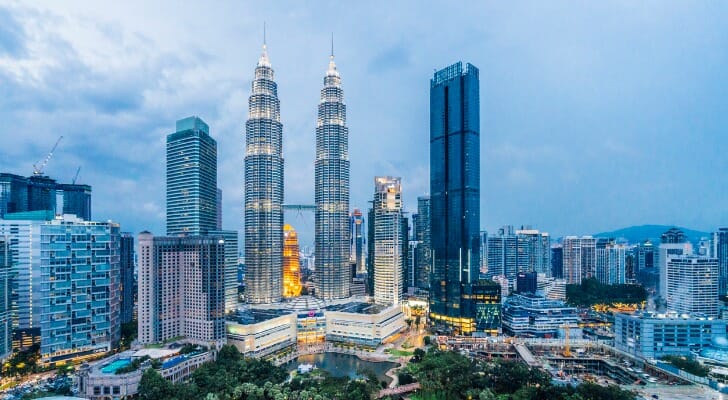 A city skyline. Malaysia has a lot to offer retirees, from its sandy beaches and extensive rainforests to its dazzling capital city of Kuala Lumpur.