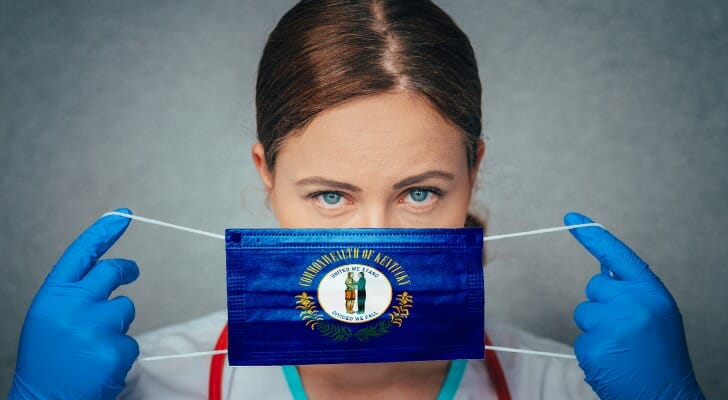 A face mask with Kentucky insignia represents kentucky relief programs