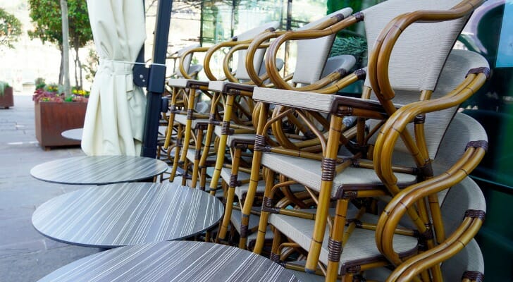 Stacked up restaurant chairs that may hopefully be occupied by happy diners again - with the help of coronavirus relief programs.