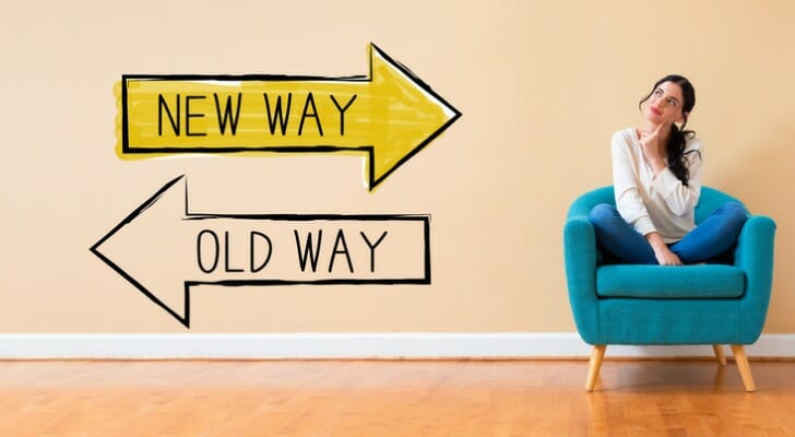 "New Way" and "Old Way" signs pointed in opposite directions