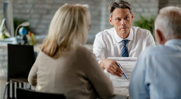 An attorney helps a couple make an estate plan