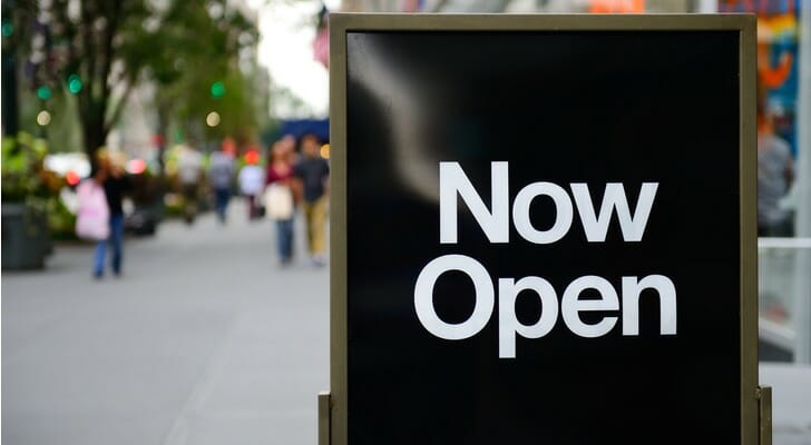"Now Open" sign