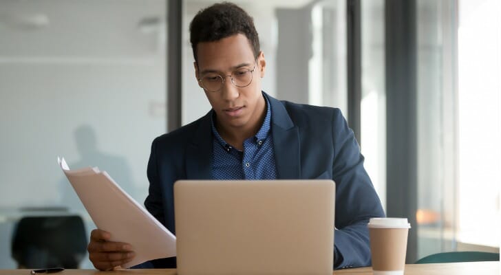 Investor studies a Form 10-K