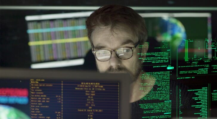 A bullish investor reviews their investments.