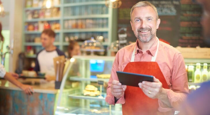A business owner checking his owner's equity in his business.