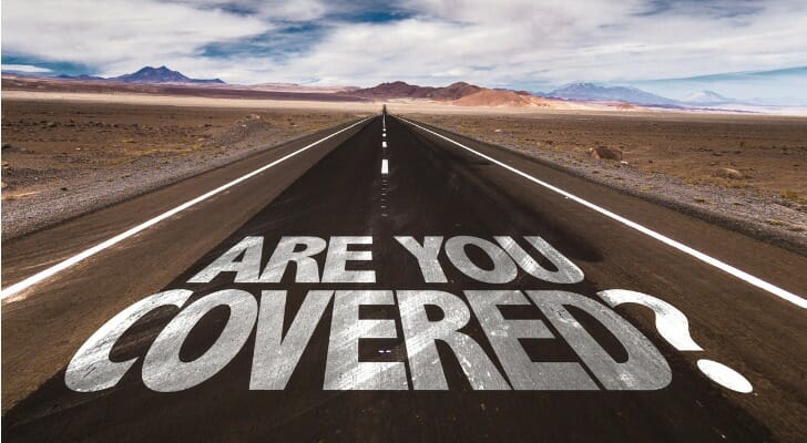 "ARE YOU COVERED" written on a highway