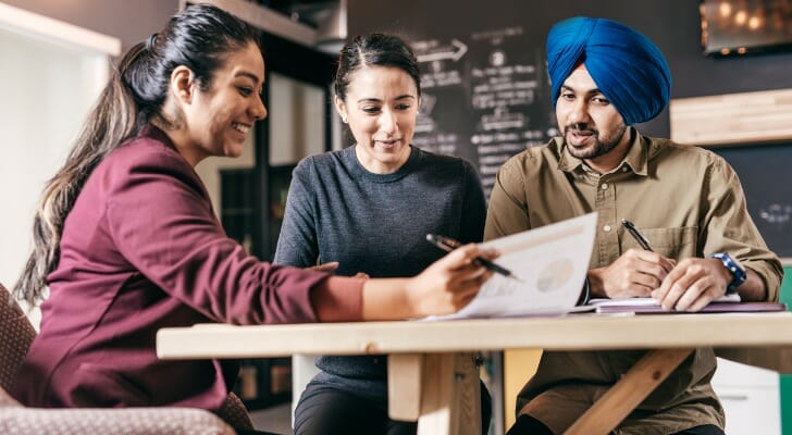 Small business owners review a short-term loan application