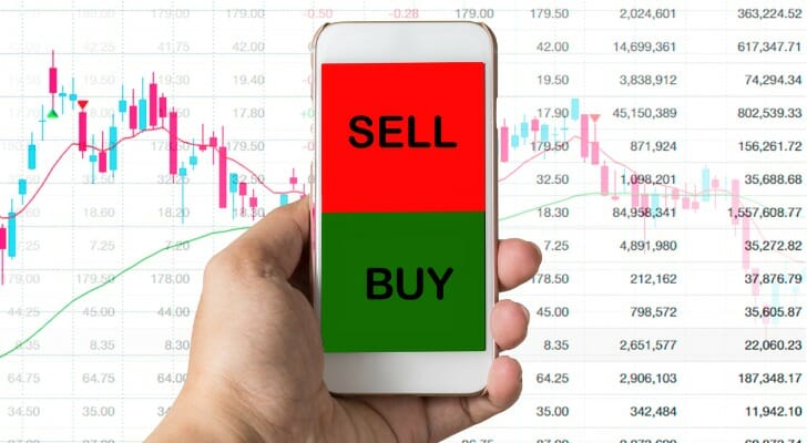 A phone presenting two options, buy and sell.