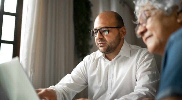 A financial advisor building a family financial plan with a client.