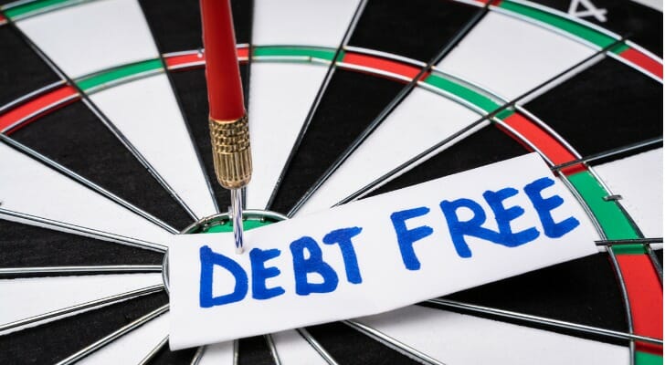 A dartboard representing the goal of being "debt free."