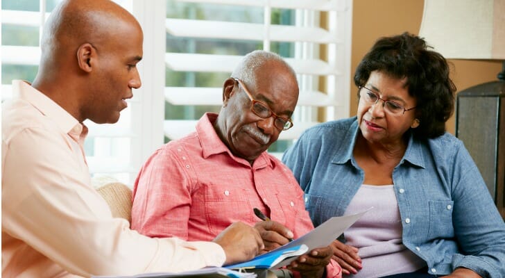 Older couple signs a will