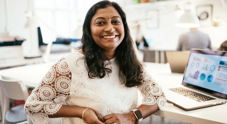 Indian woman using her investing software.