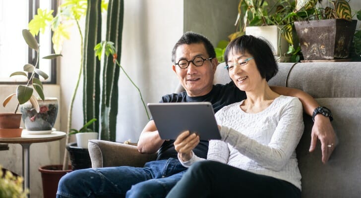 Retired couple review the differences between an IUL vs 401k.