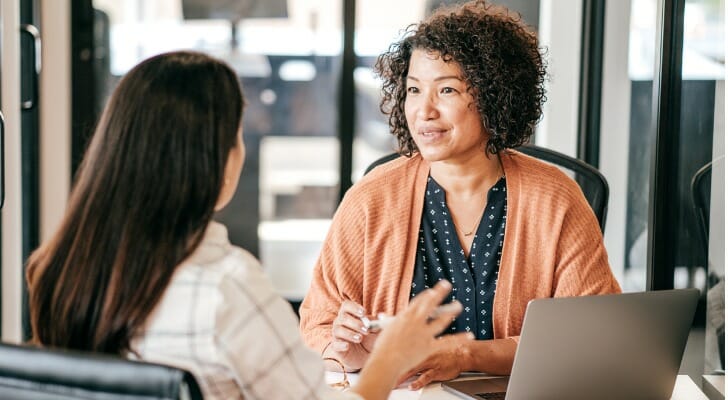 A broker-dealer talks to a prospective client.