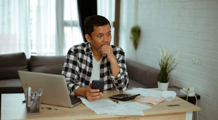 A man compares thinkorswim vs. E*TRADE.