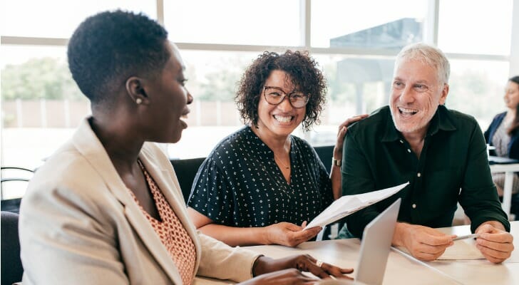 In independent financial advisor meeting with clients.