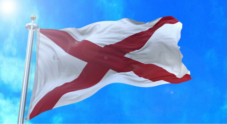 The Alabama state flag. To get a divorce in Alabama, one spouse must be a resident of the state for at least six months.