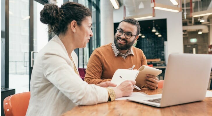 Woman working with her financial advisor.