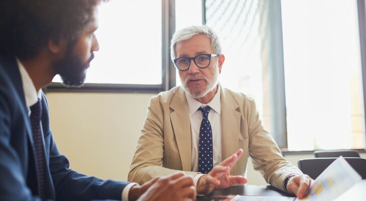 An investor talks with his financial advisor