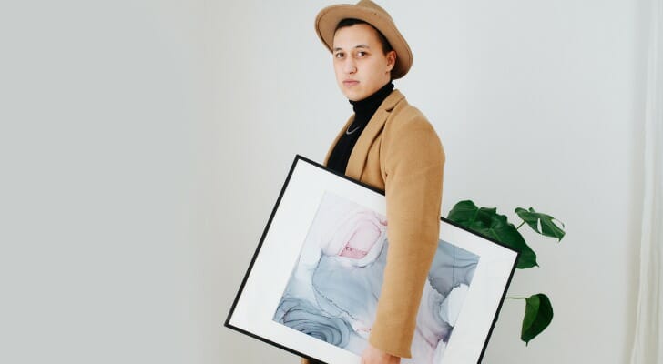 Art investor walks out of an auction with a painting