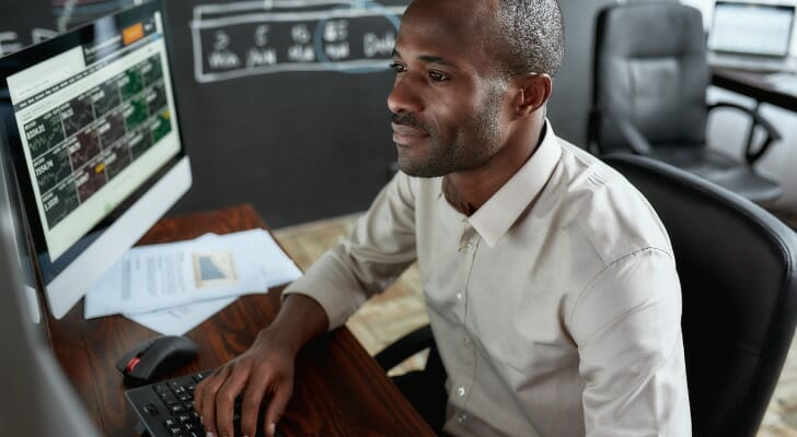 Man checks his investments