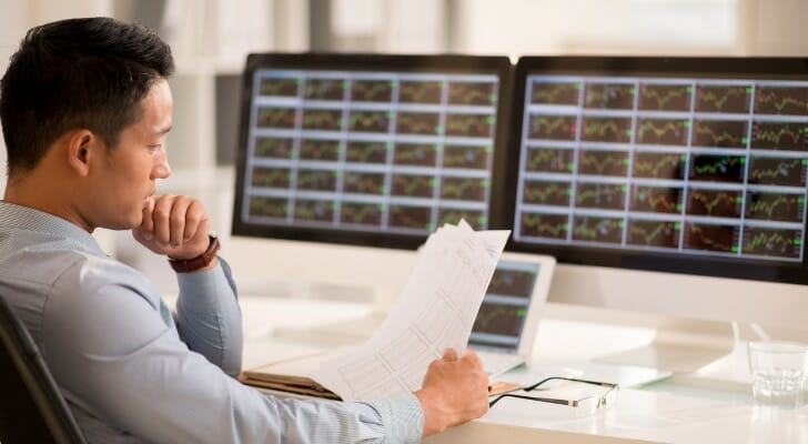 A man considers his strangle options contract