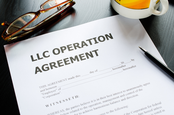 A closeup of a limited liability company operation agreement.