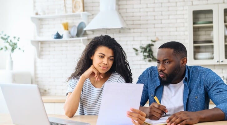 Couple checks their dividends