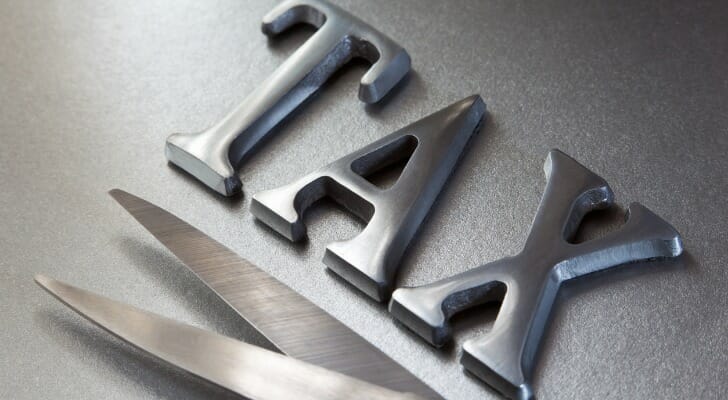 "TAX" and a pair of scissors