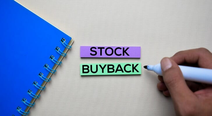 Stock buyback written on sticky notes