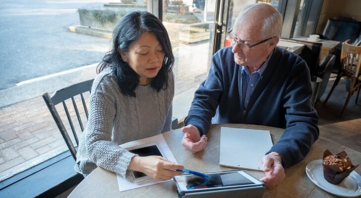 Asian woman studies her inherited IRA