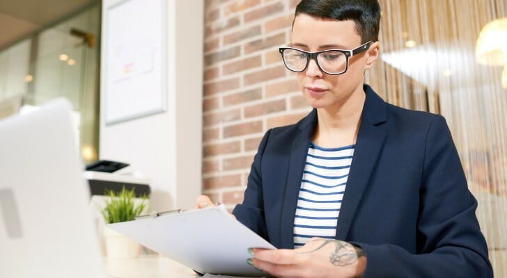 Money manager checking her accounts