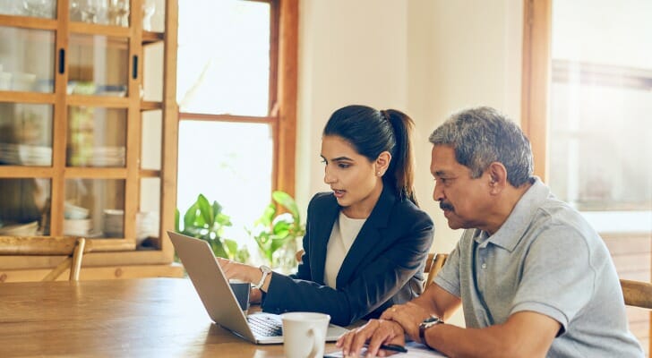 A homeowner and their financial advisor reviewing the Section 121 Exclusion.