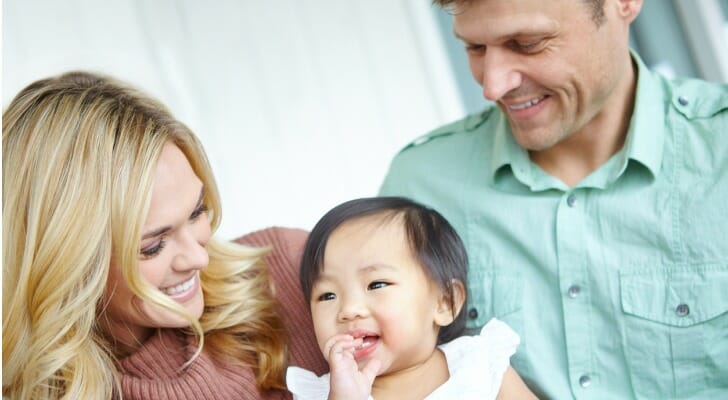 Couple with adopted child