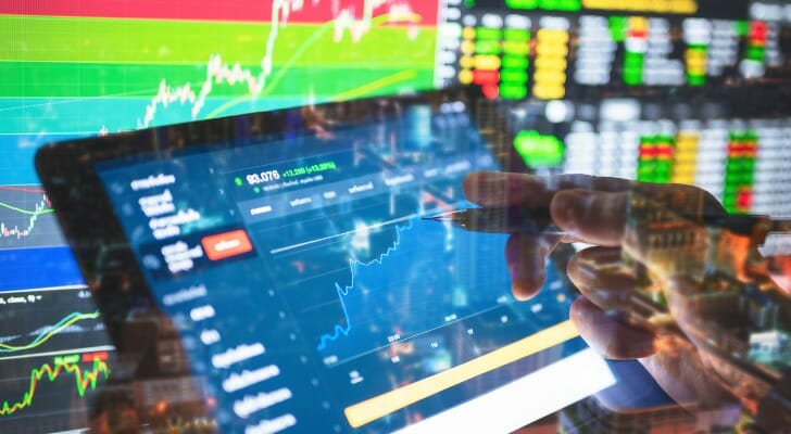 Investor buying and selling forex assets