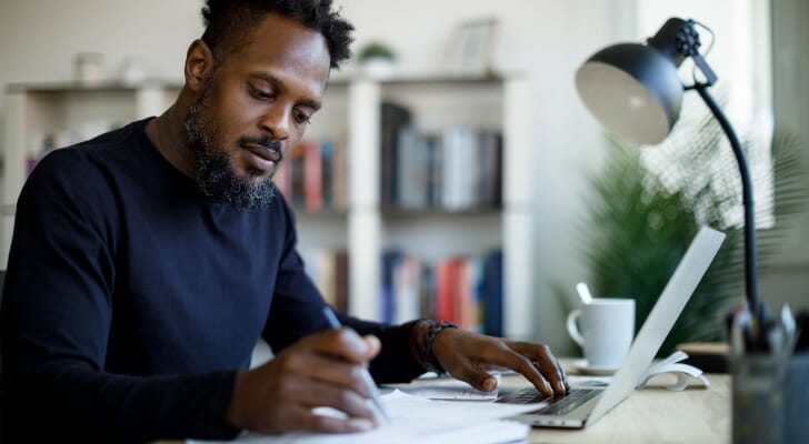 A man reviewing his savings.