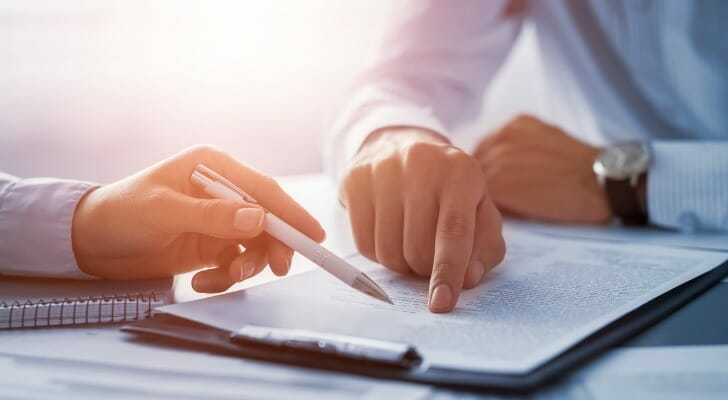 Financial advisor explaining recommendations to a client