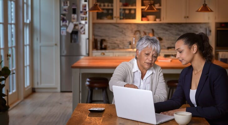 Financial advisor meets with a client.