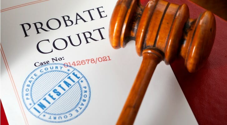 Closeup of a judge gavel and a probate court case file.