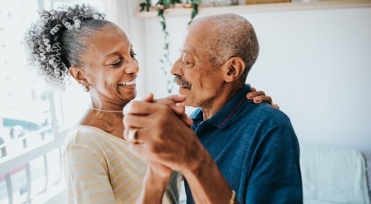 Retired couple dancing