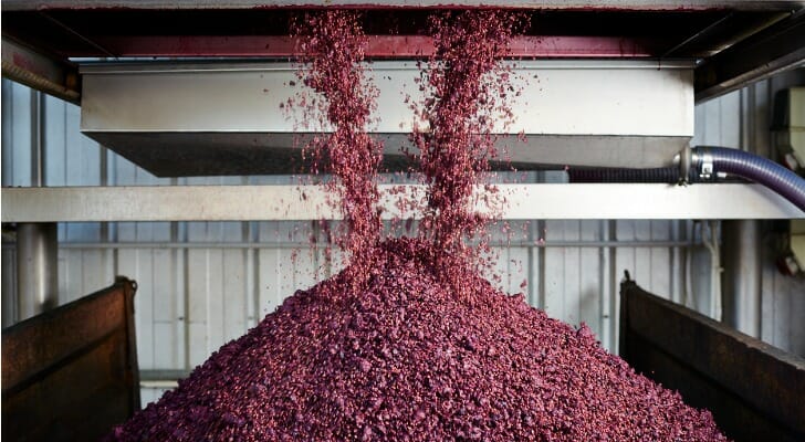 Unloading grape skins